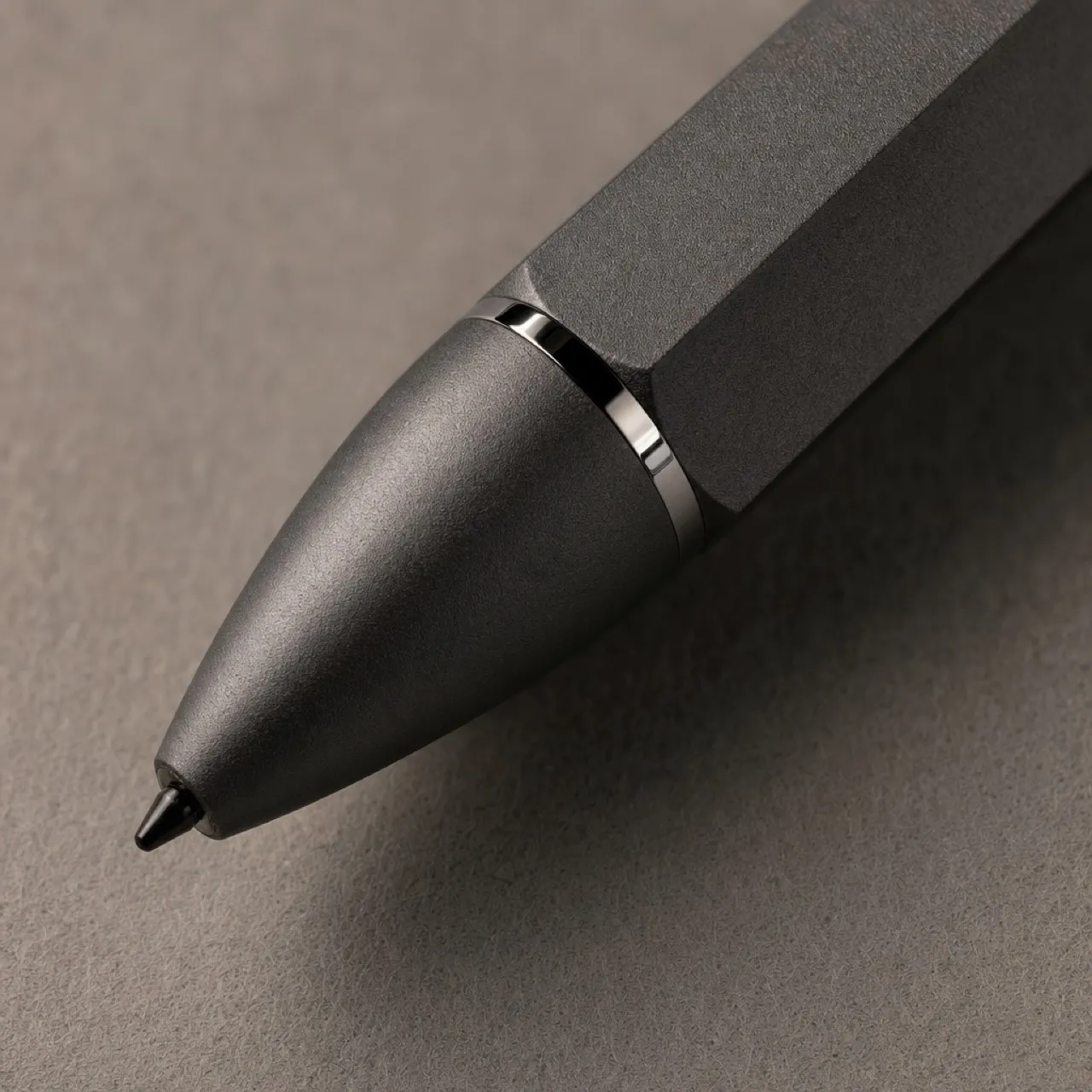 Macro shot of the stylus nib and bead-blasted aluminium barrel
